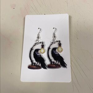Raven Earrings with Light Bulb Design